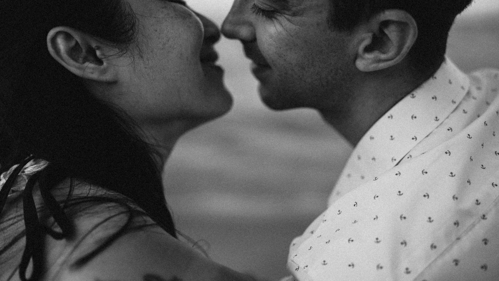 Couple sharing a tender moment, noses touching