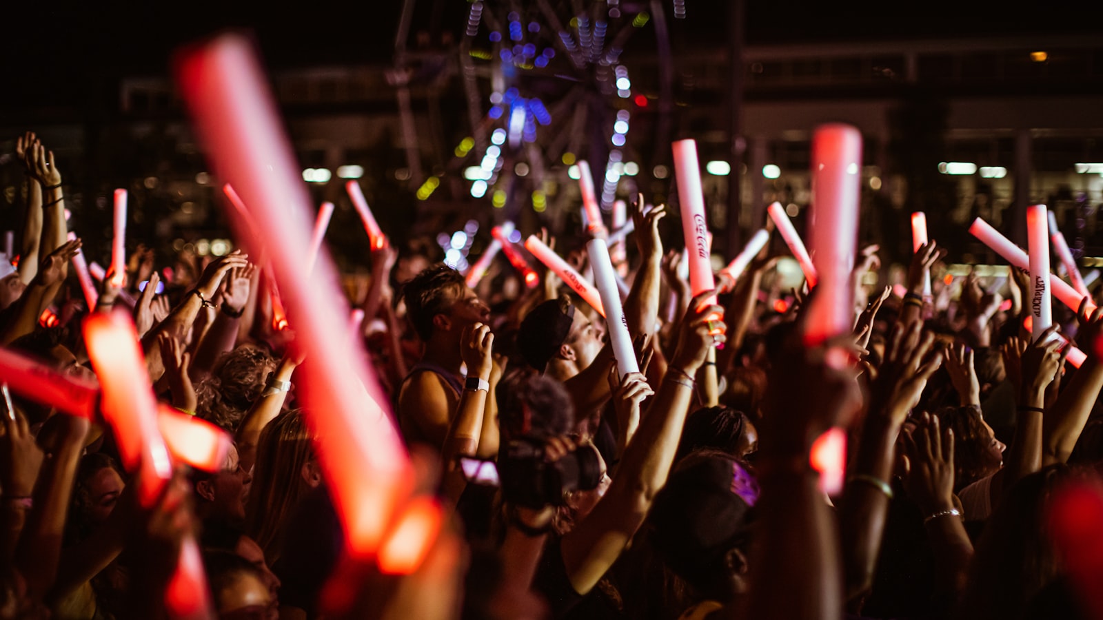 a group of people holding candles