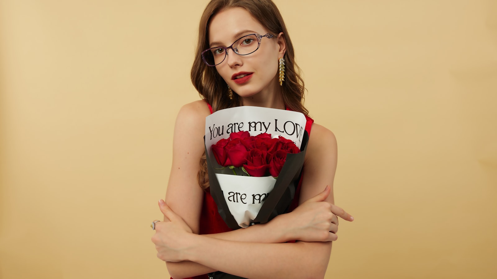 Woman holds roses, saying "you are my love."