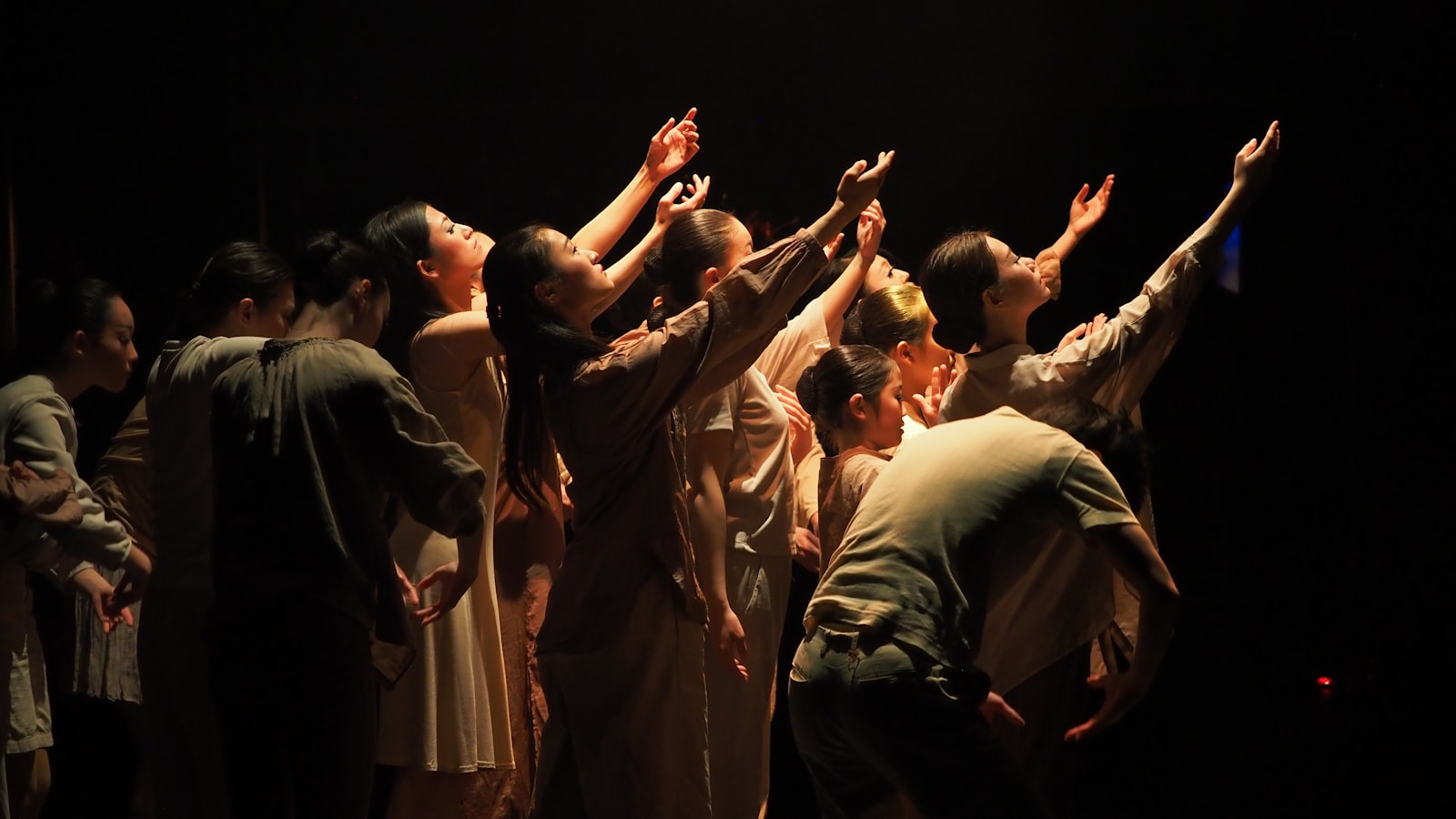 a group of people standing on top of a stage