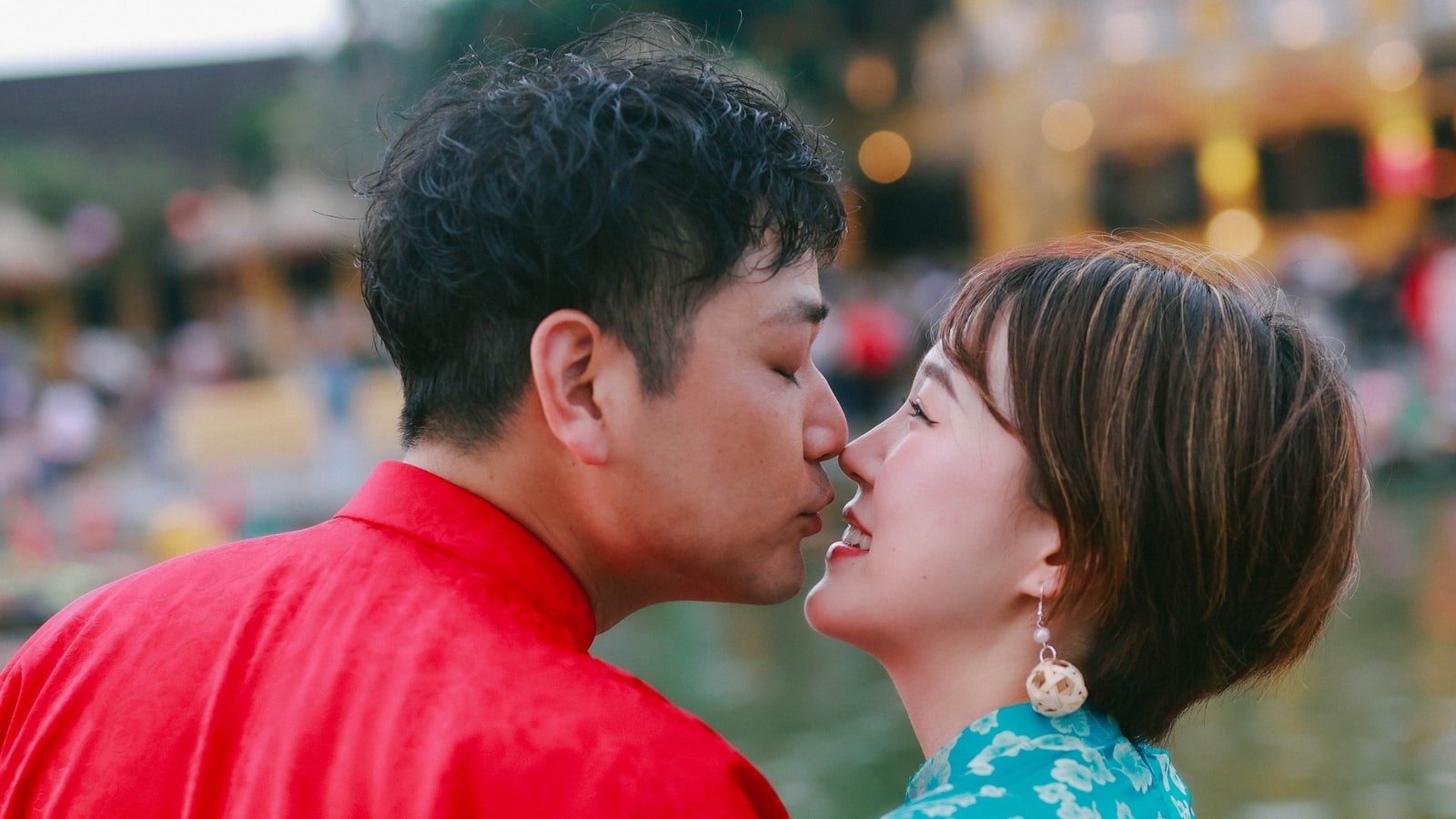 Couple sharing a tender moment outdoors