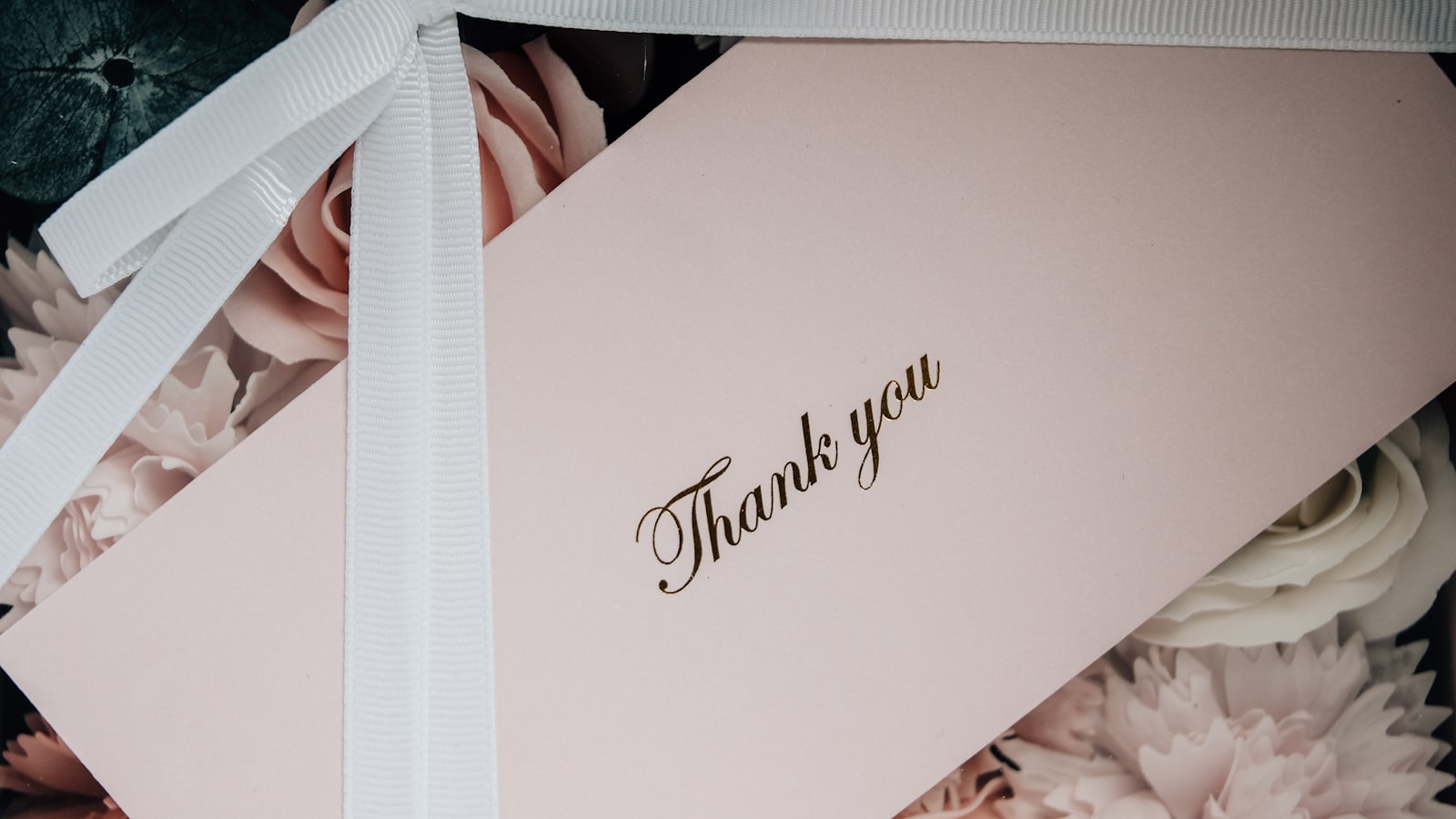 white box with white ribbon